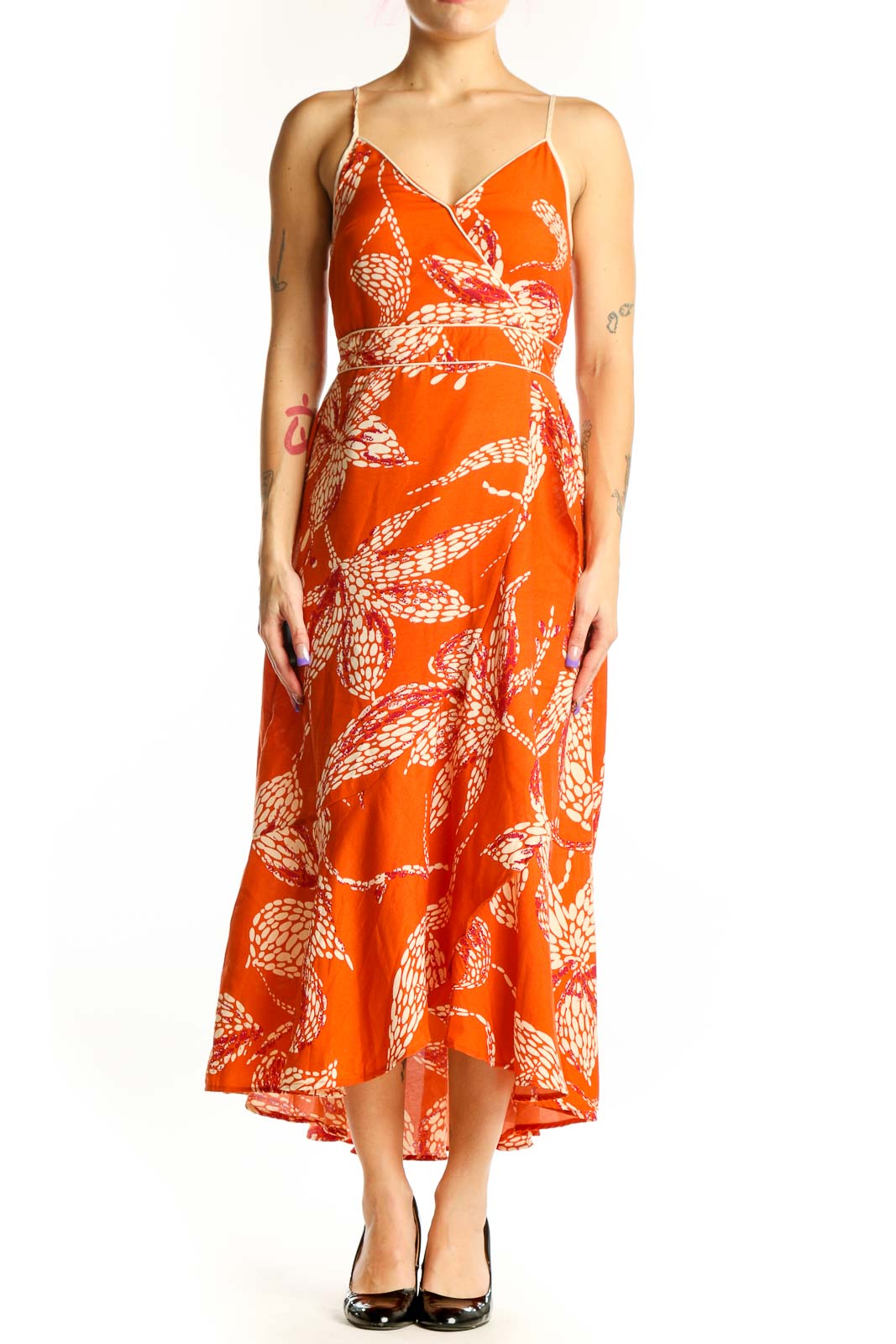 Front view of orange floral wrap midi dress with white botanical leaf print and spaghetti straps