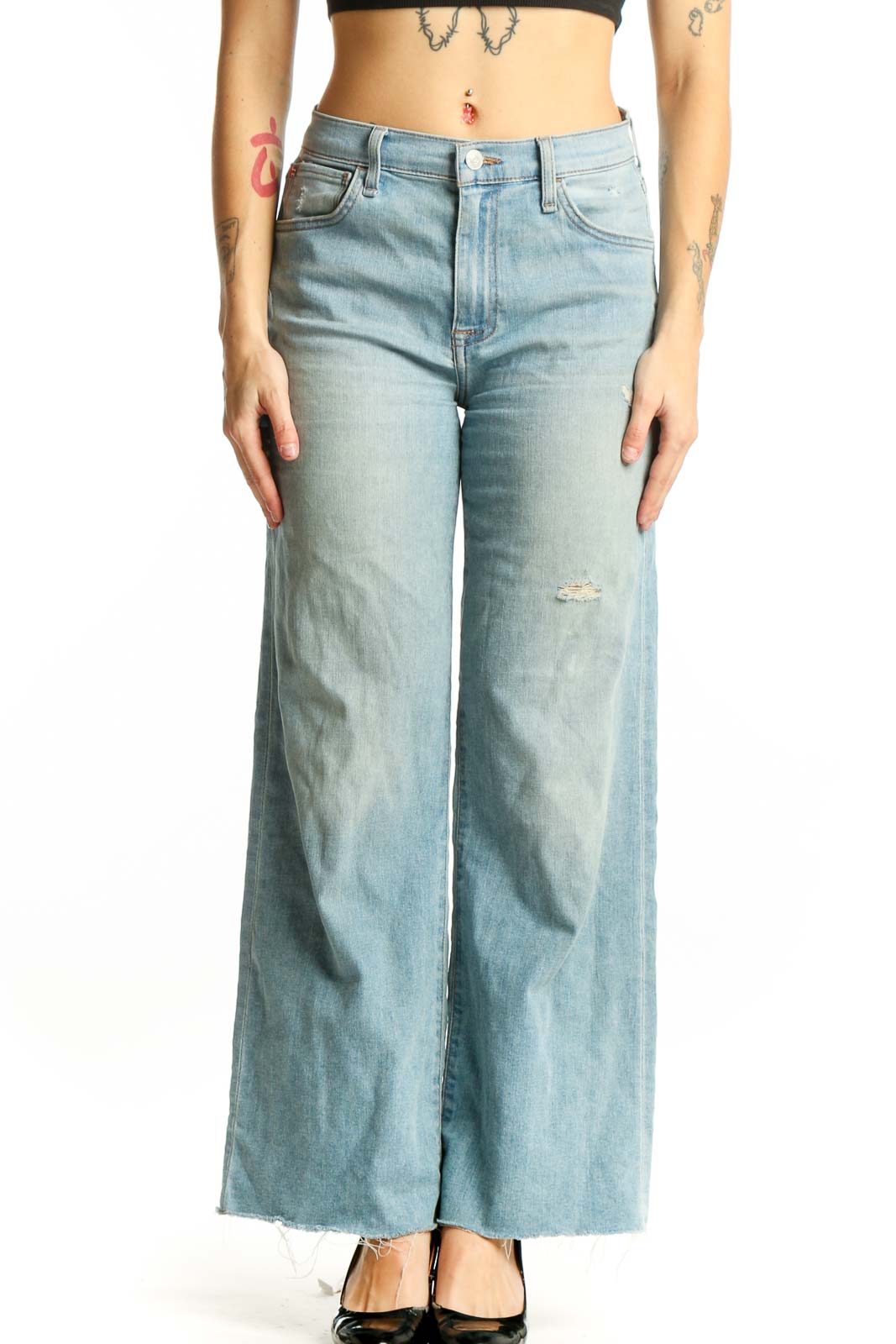 Light blue distressed Hudson Jeans wide-leg denim with cropped hem, front view on model