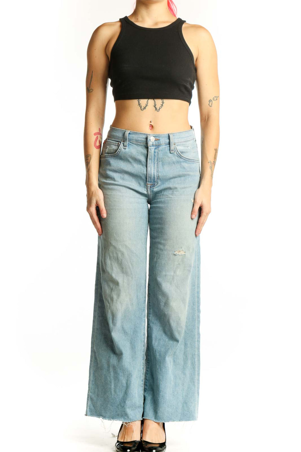 Light blue distressed Hudson Jeans wide-leg denim with cropped hem, front view on model