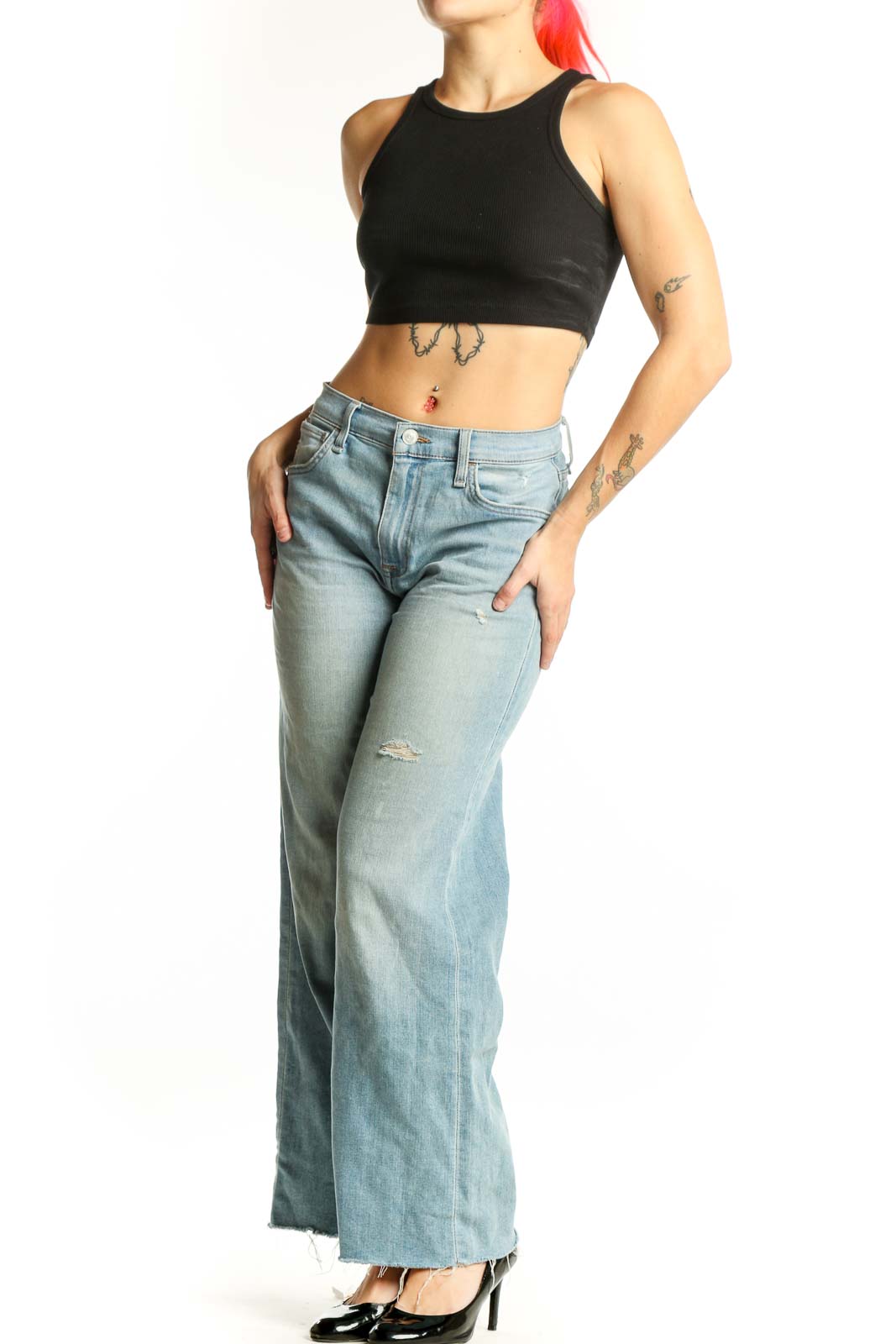 Light blue distressed Hudson Jeans wide-leg denim with cropped hem, front view on model