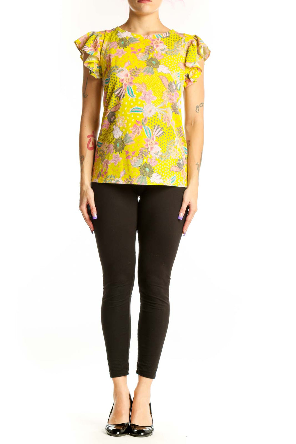 Yellow floral LOFT top with ruffle cap sleeves and botanical print, front view on model