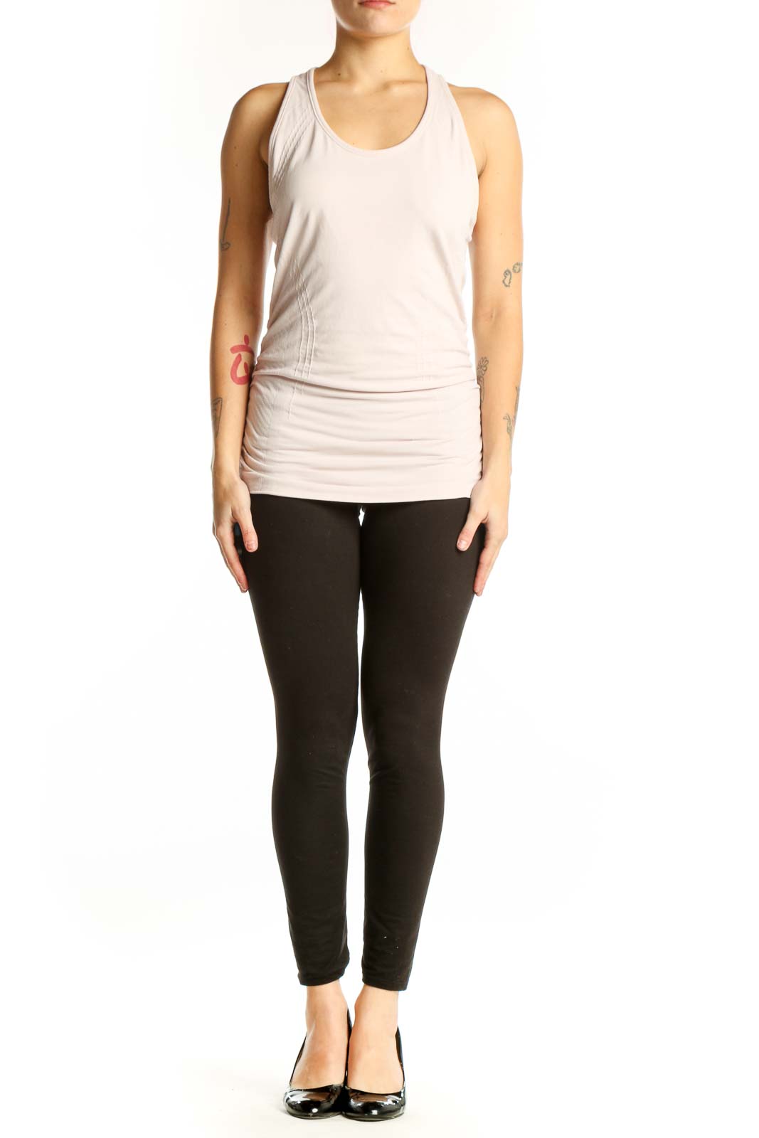 Cream Athleta racerback tank top with ruched side detailing, front view on model