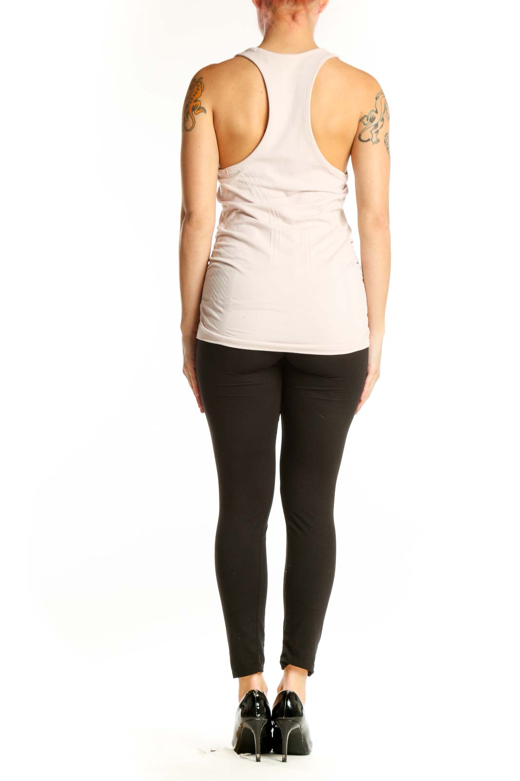 Cream Athleta racerback tank top with ruched detailing, back view on model