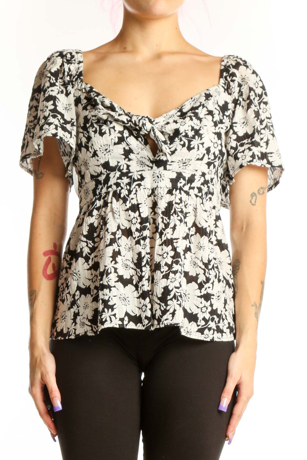 Black and white floral puff sleeve top with sweetheart neckline and gathered front detail, front view