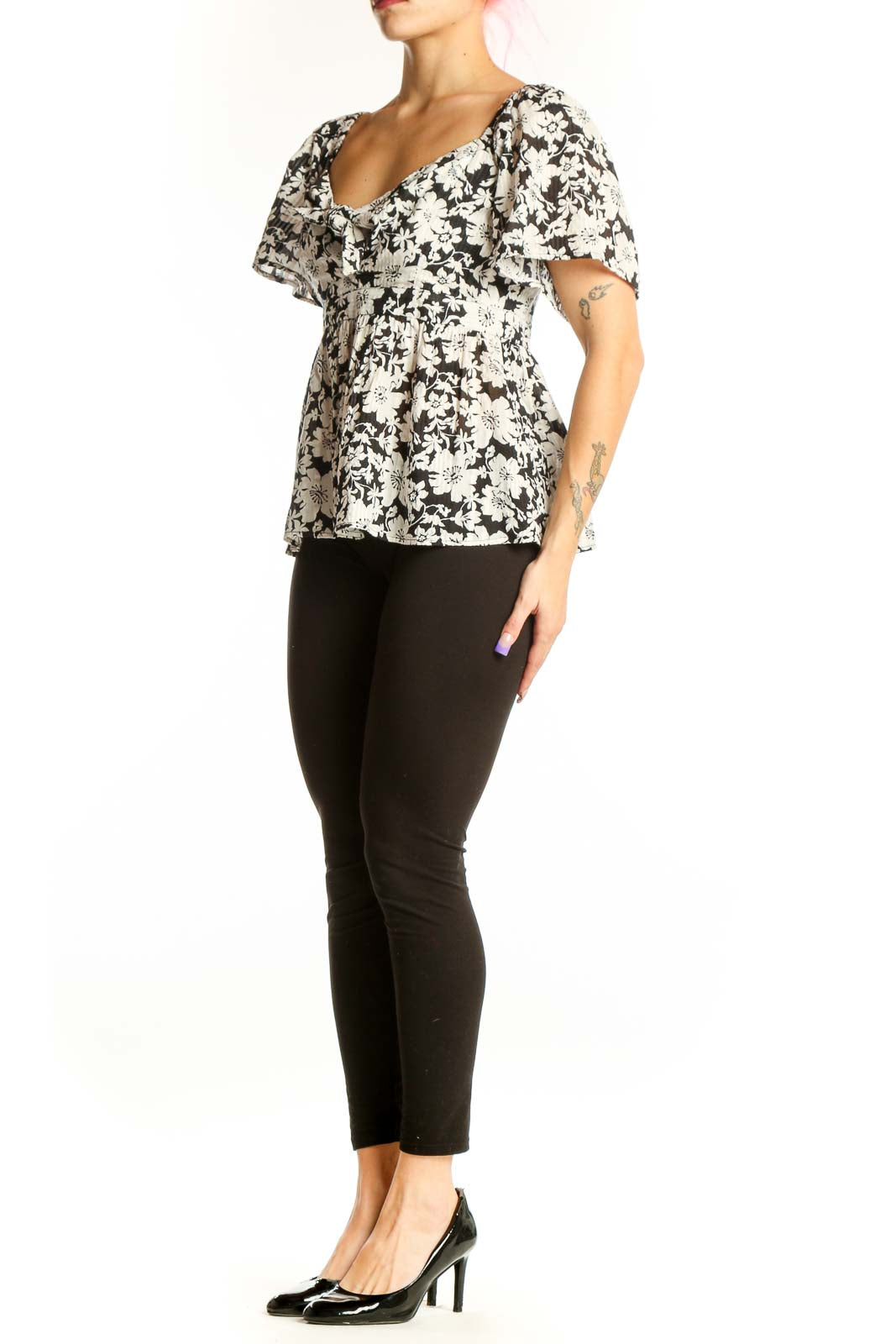 Black and white floral puff sleeve top with sweetheart neckline and gathered front detail, front view