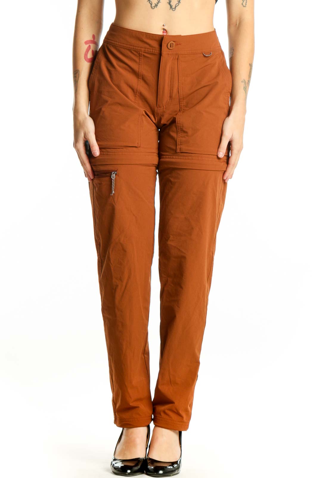 Front view of rust brown convertible cargo pants with zip-off legs and cargo pockets, size XS