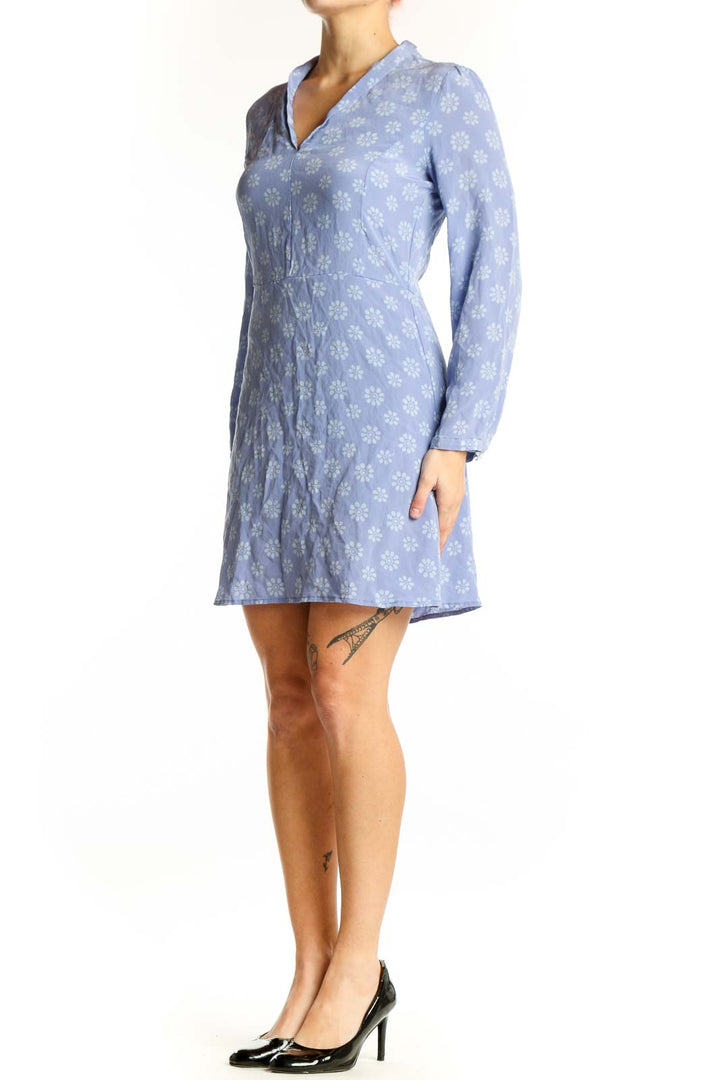 Blue floral silk dress with long sleeves and V-neckline, front view