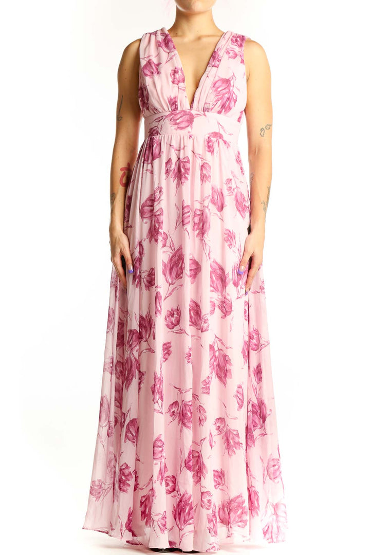 Pink floral V-neck sleeveless maxi dress with empire waist and flowing skirt, front view