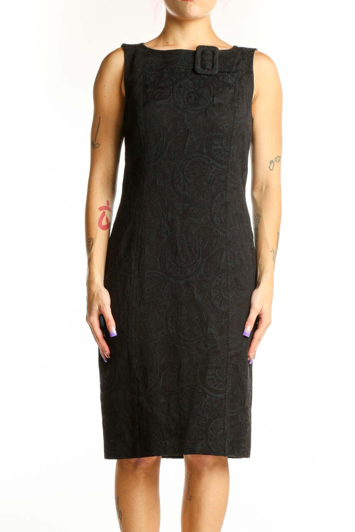 Black jacquard sleeveless sheath dress with crew neckline and buckle shoulder detail, front view