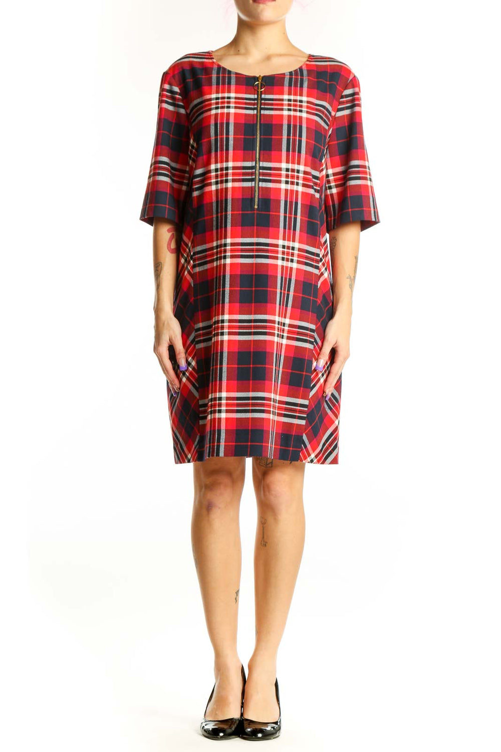 Red, navy, and white plaid shift dress with front zip closure and half-length sleeves