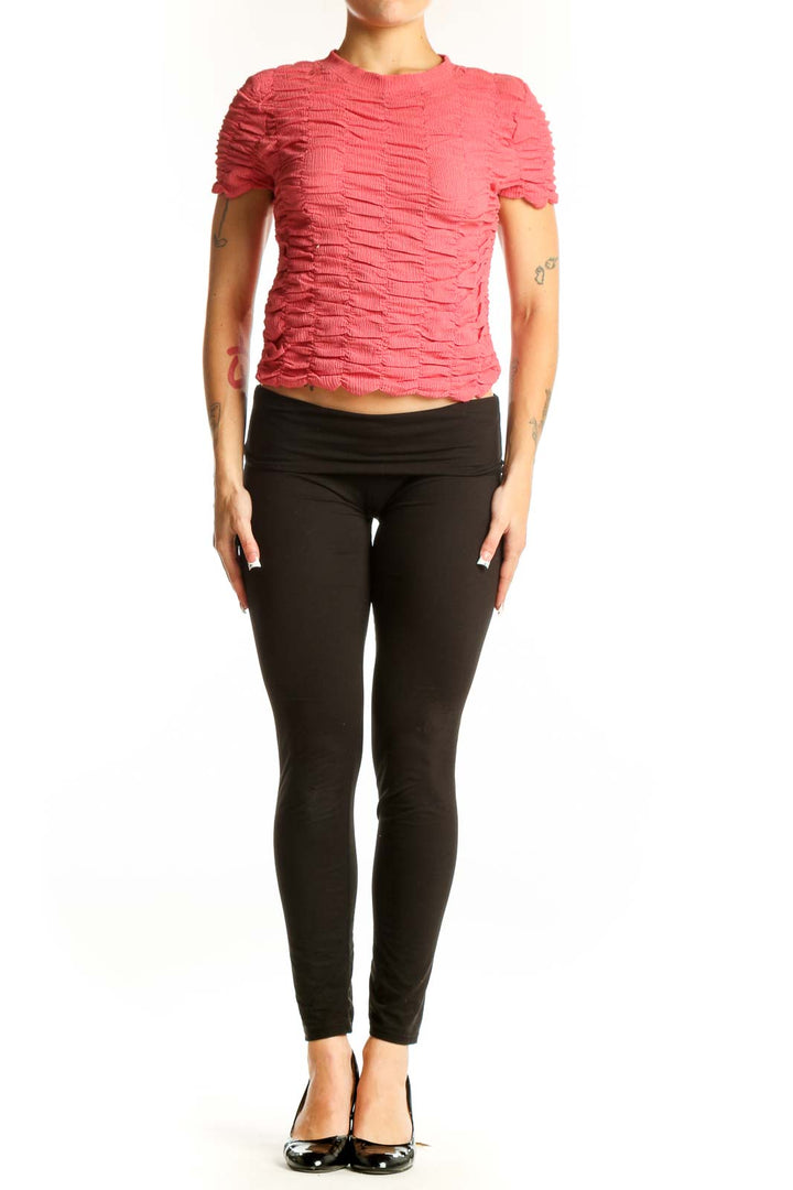 Front view of pink textured crop top by House of Harlow 1960