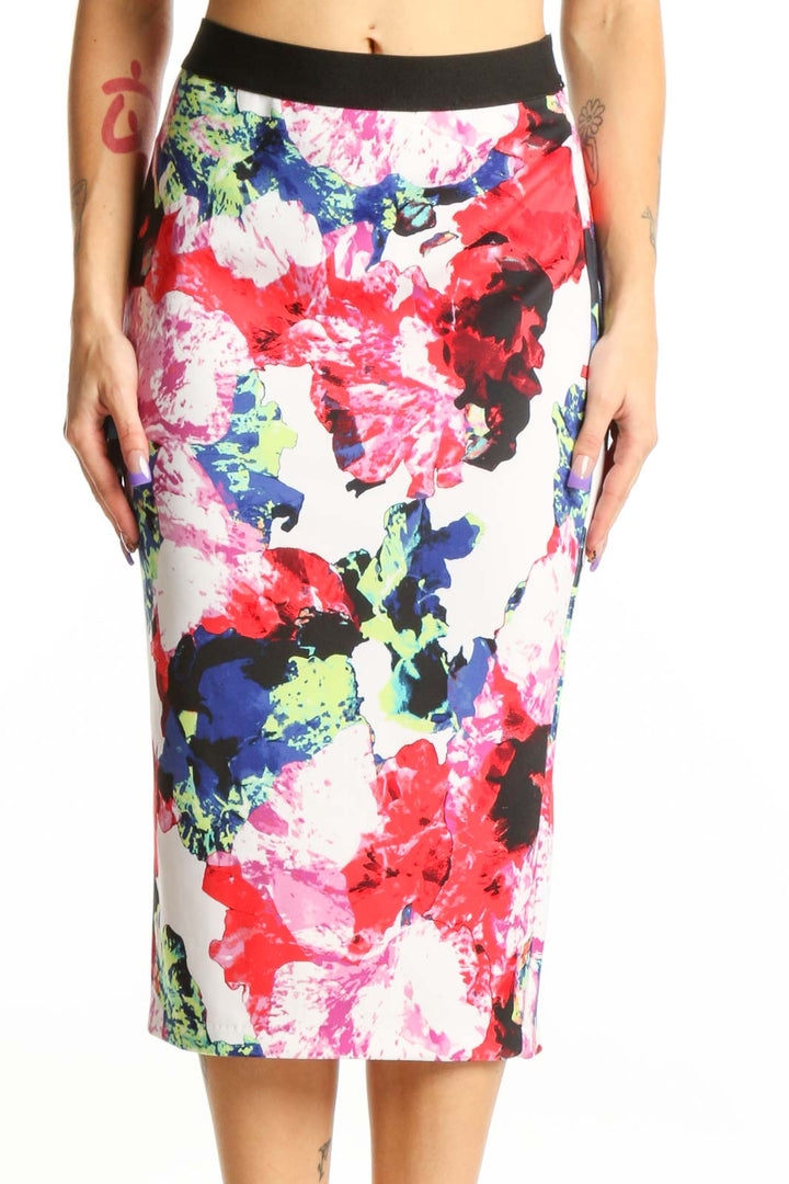 Multicolor floral pencil skirt with watercolor print in red, pink, navy, yellow, and white, featuring black elastic waistband