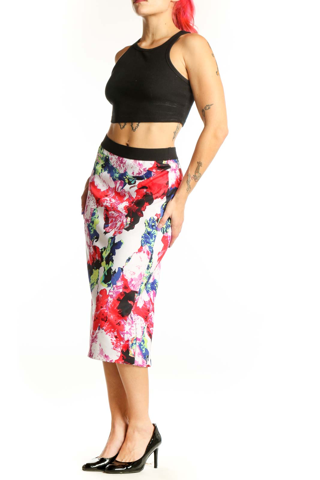 Multicolor floral pencil skirt with watercolor print in red, pink, navy, yellow, and white, featuring black elastic waistband