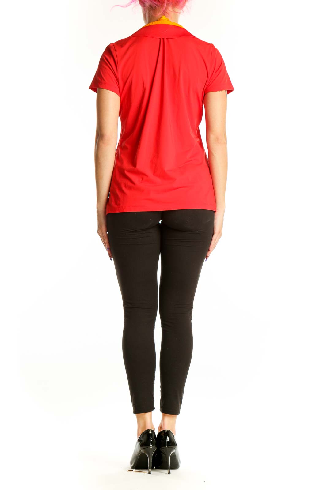 Red polo short sleeve top back view, showing clean design and fit on model