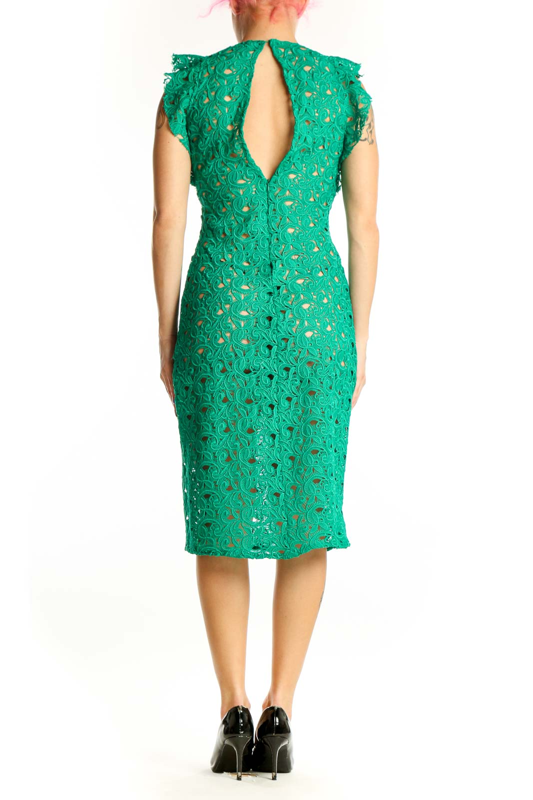 Back view of green lace midi dress showing ruffle shoulder detail and elegant lace construction