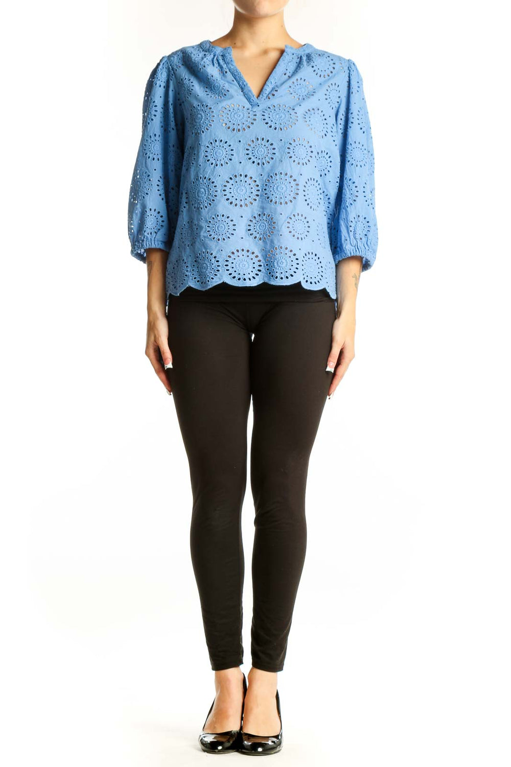 Front view of blue cotton eyelet lace blouse with V-neck and three-quarter sleeves