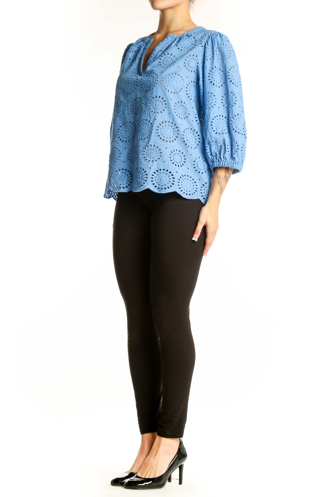 Front view of blue cotton eyelet lace blouse with V-neck and three-quarter sleeves