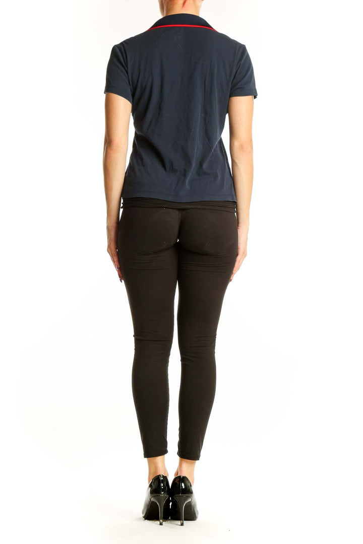 Navy cotton polo shirt with red and gray contrast collar by Louis Castel, back view