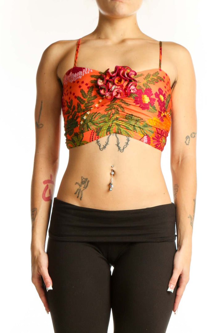 Front view of orange floral cropped camisole top by Joie with tropical print