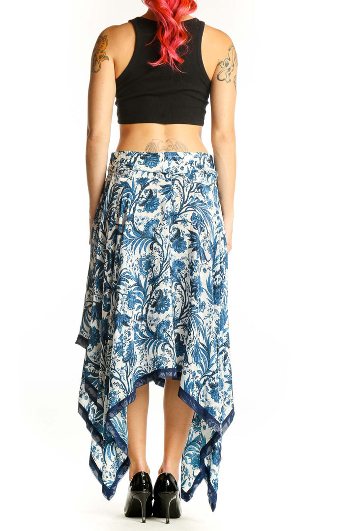 SilkRoll blue floral handkerchief hem skirt back view showing flowing asymmetrical silhouette