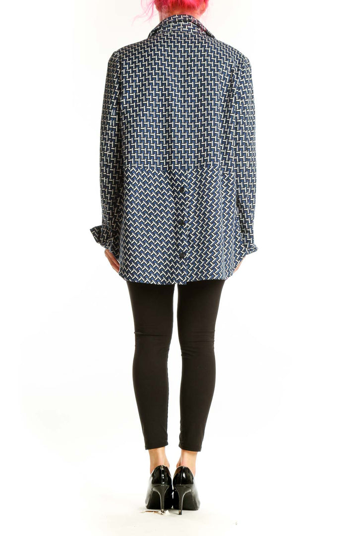 Back view of navy geometric print jacket showing relaxed fit and button-up design