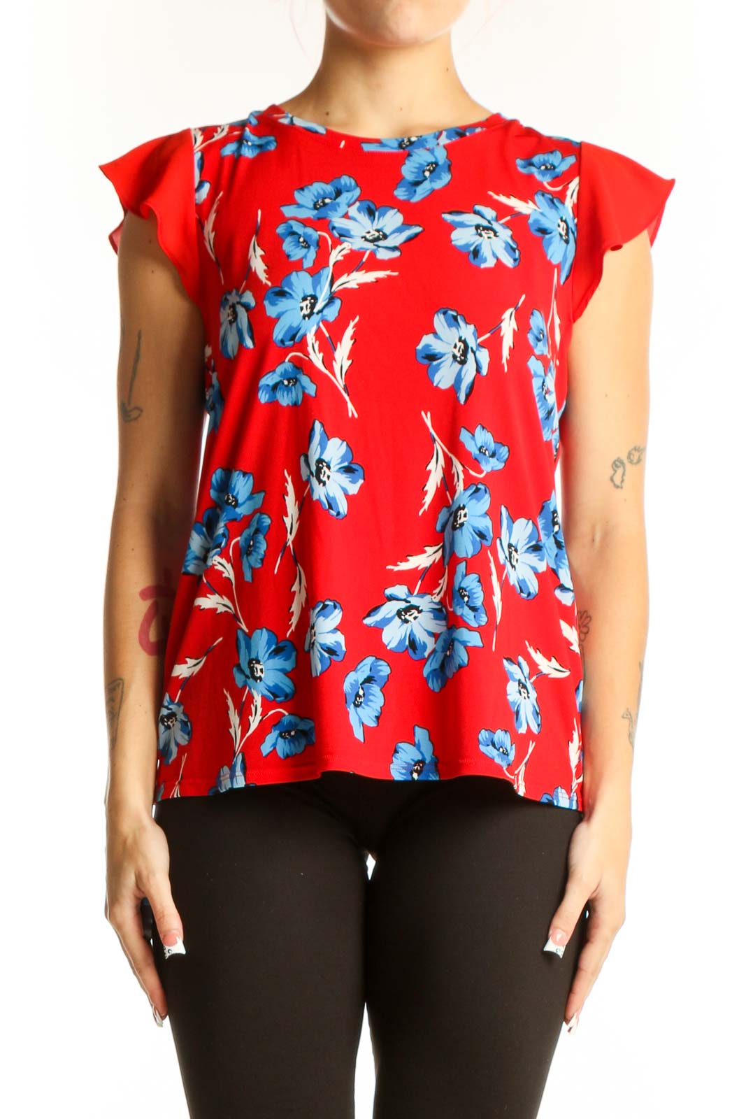 Front view of red CeCe blouse with blue floral print and flutter sleeves