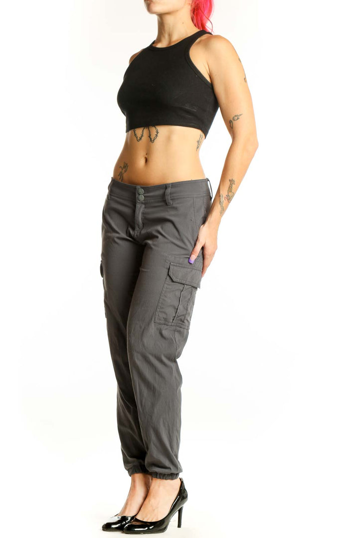prAna gray cargo jogger pants front view with side pockets and tapered ankles on model