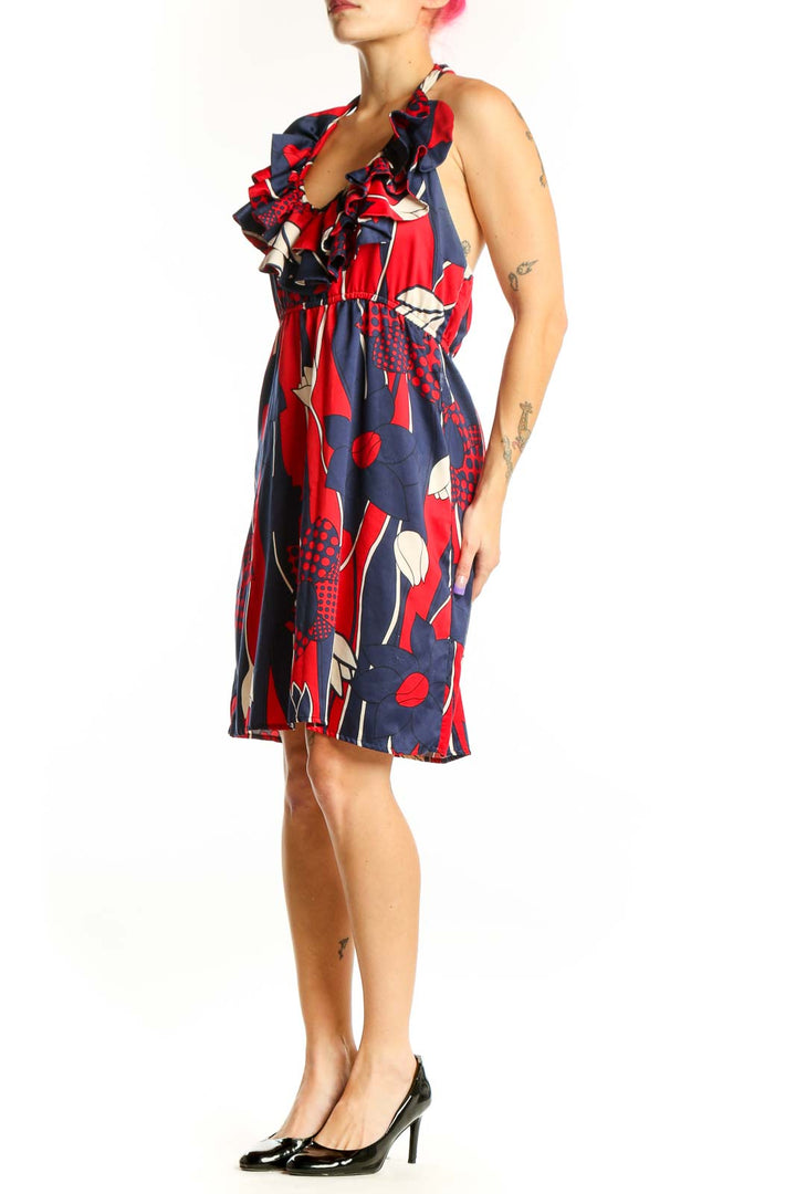 Red and navy abstract geometric ruffle midi dress with V-neckline and empire waist by JUDITHMARCH