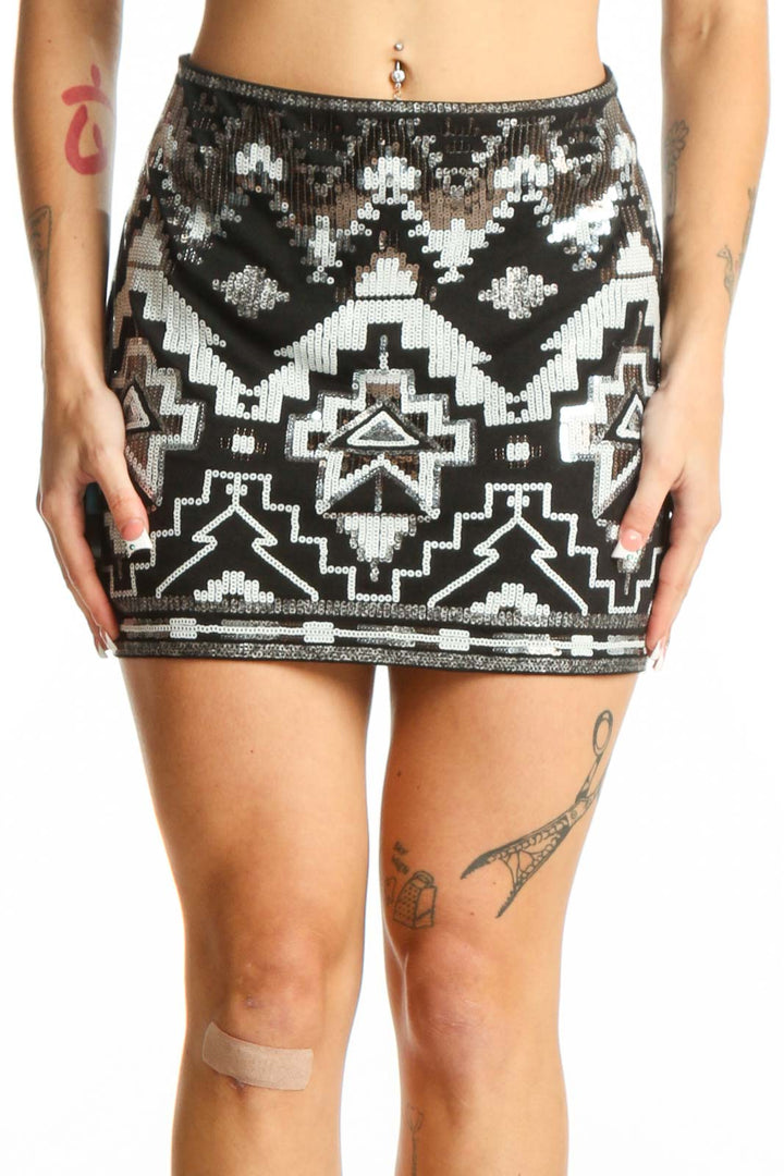 Front view of Express Black and White Sequin Aztec Mini Skirt with geometric pattern