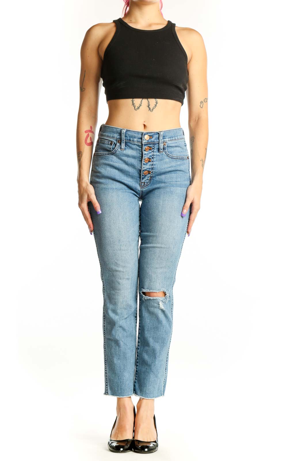 Front view of light blue J.Crew distressed cropped jeans with button-fly closure and ripped knee detail