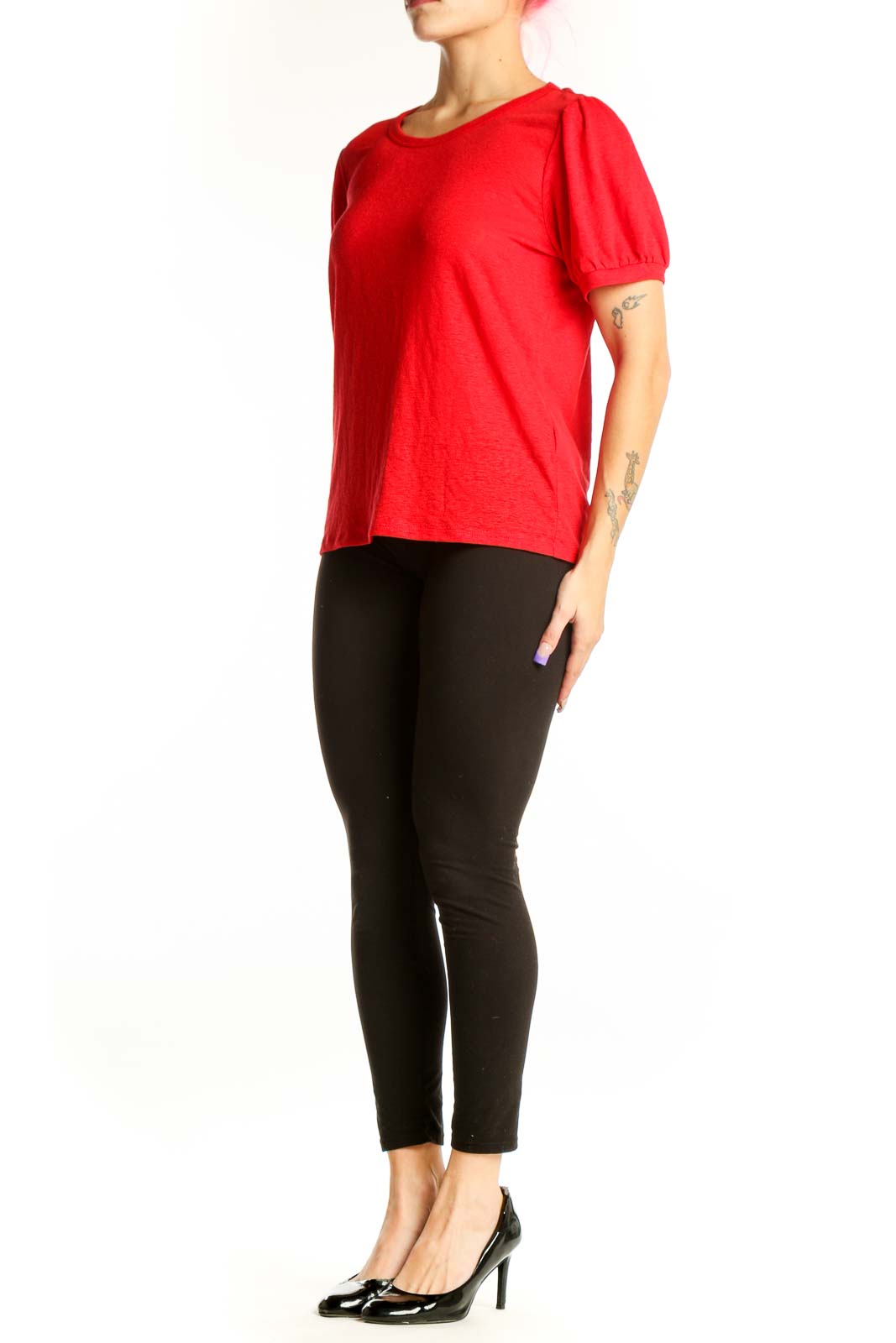 Red puff sleeve top by Banana Republic with crew neckline, front view on model