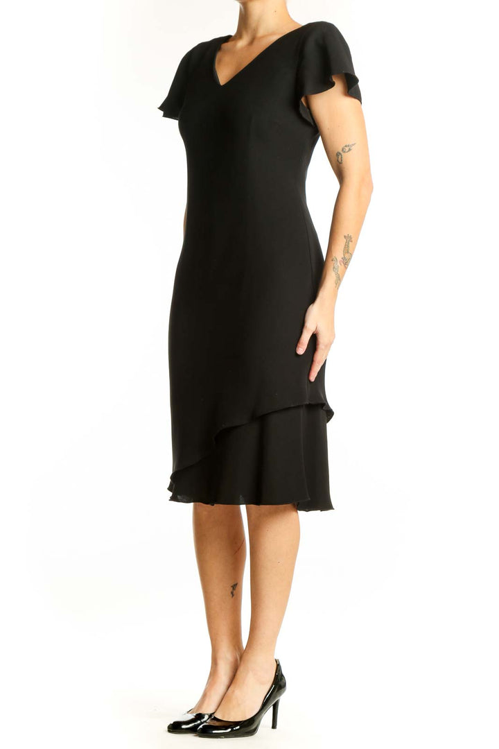 Black flutter sleeve midi dress with V-neckline and asymmetrical hemline, front view