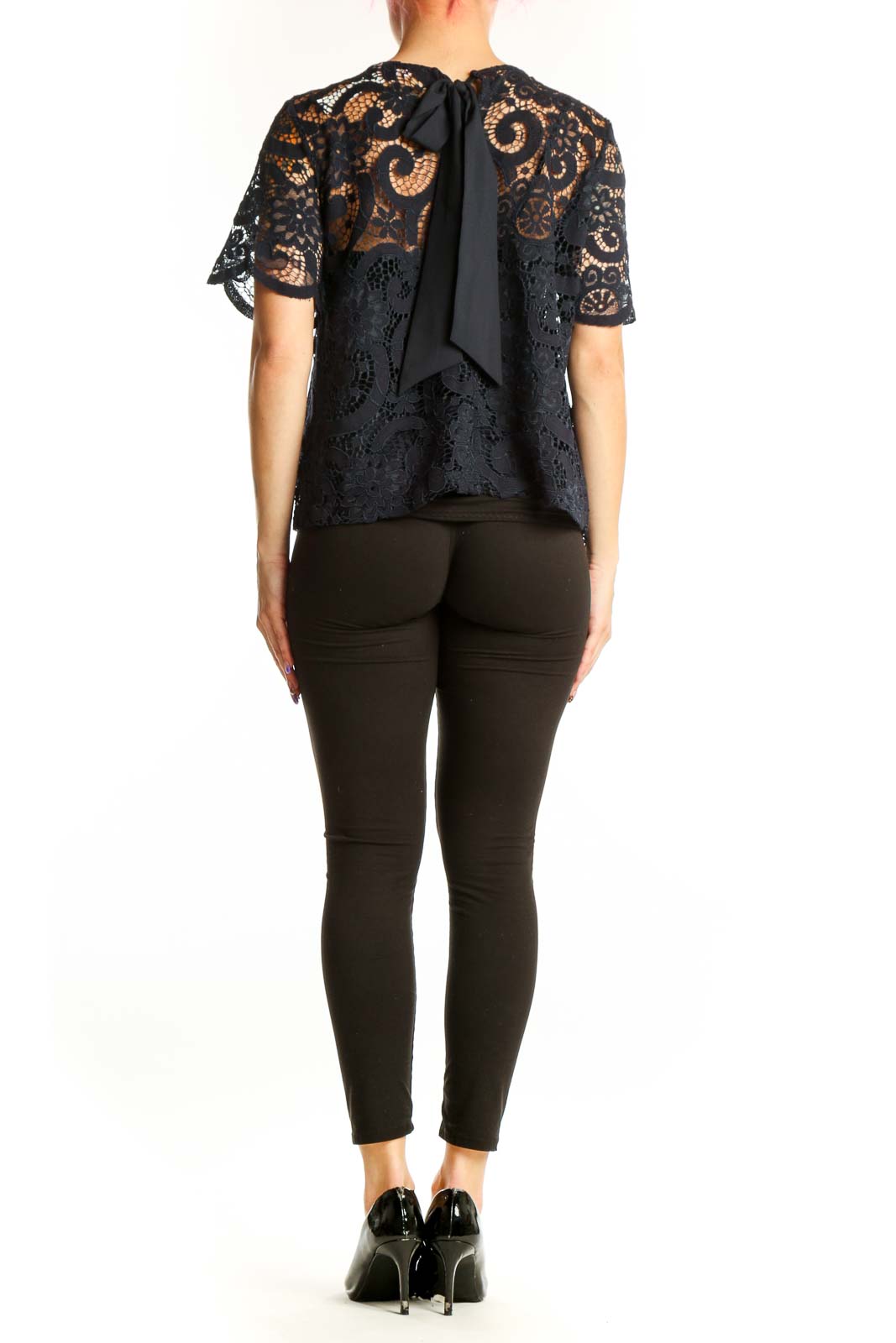 Black lace short sleeve top with all-over lace pattern, back view