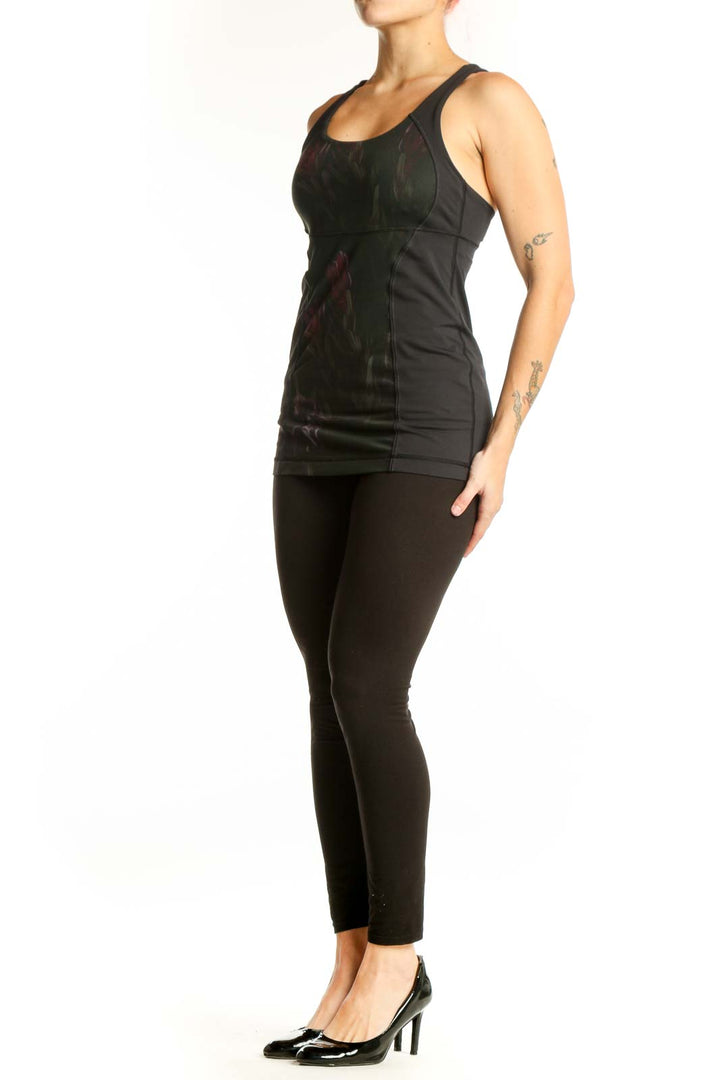 Black Lululemon tank top with burgundy floral print, racerback design, front view