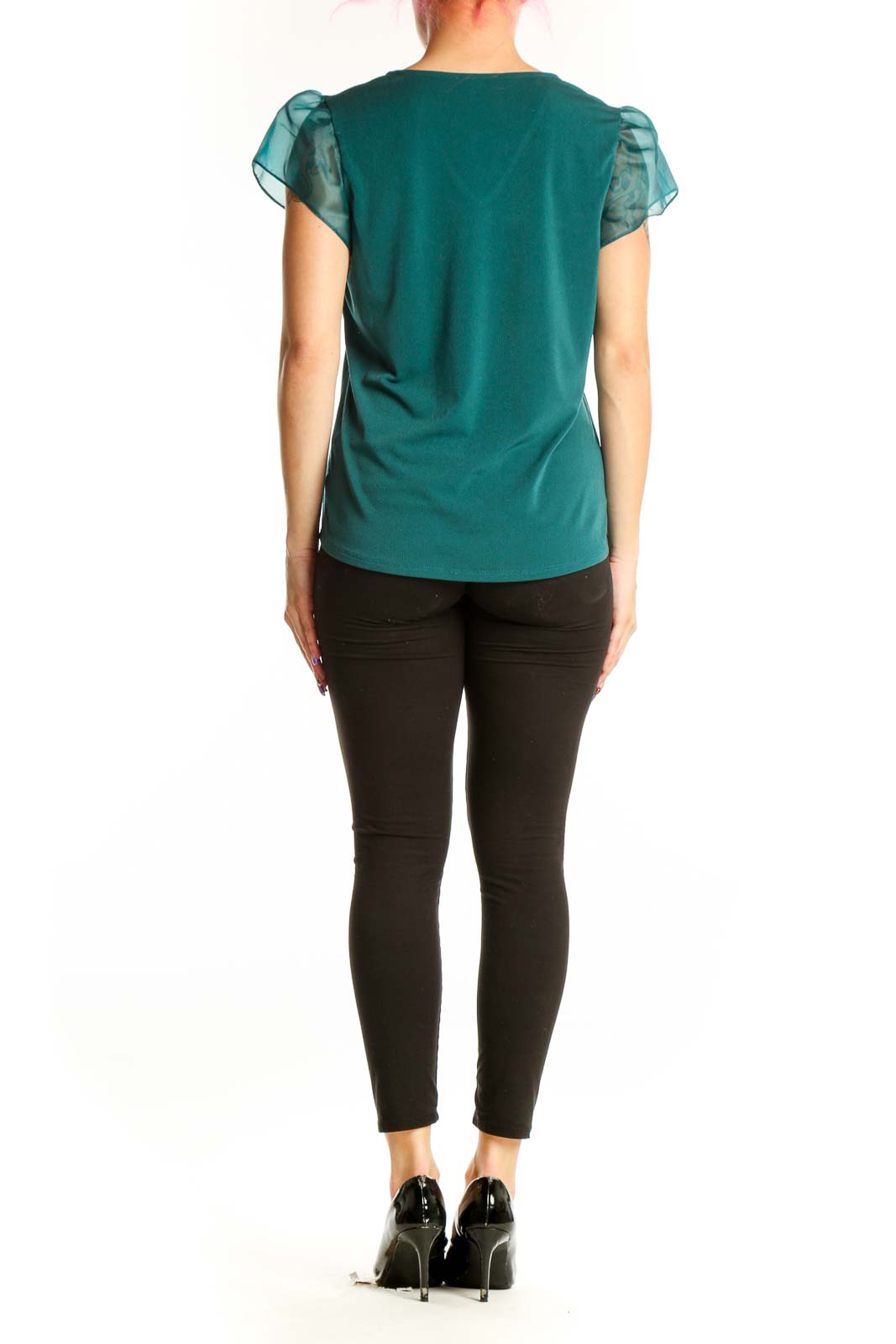 Teal puff sleeve V-neck top with sheer sleeves worn by model, back view