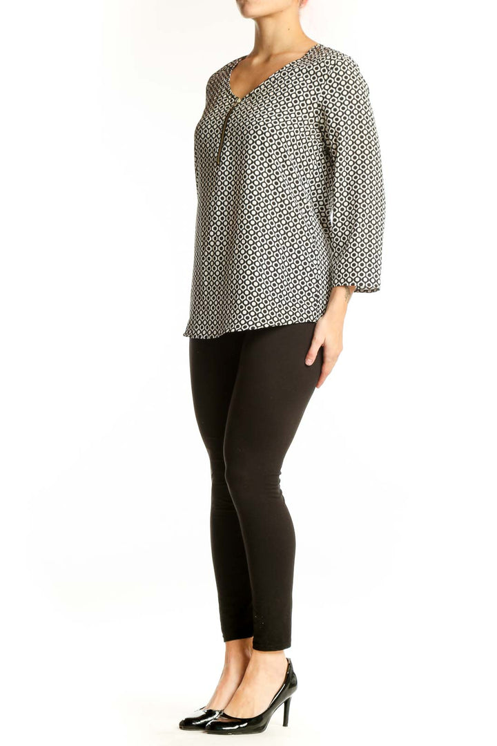 Sunny Leigh cream and black geometric print top with three-quarter sleeves and V-neckline, front view