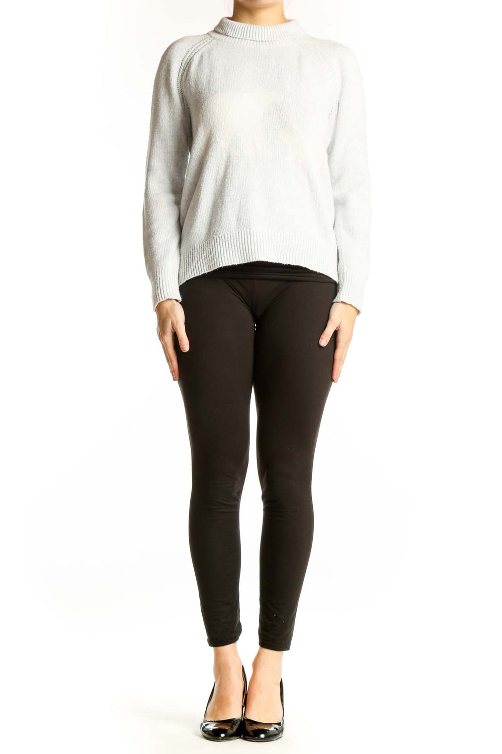 Front view of cream knit pullover sweater with crew neckline and ribbed detailing