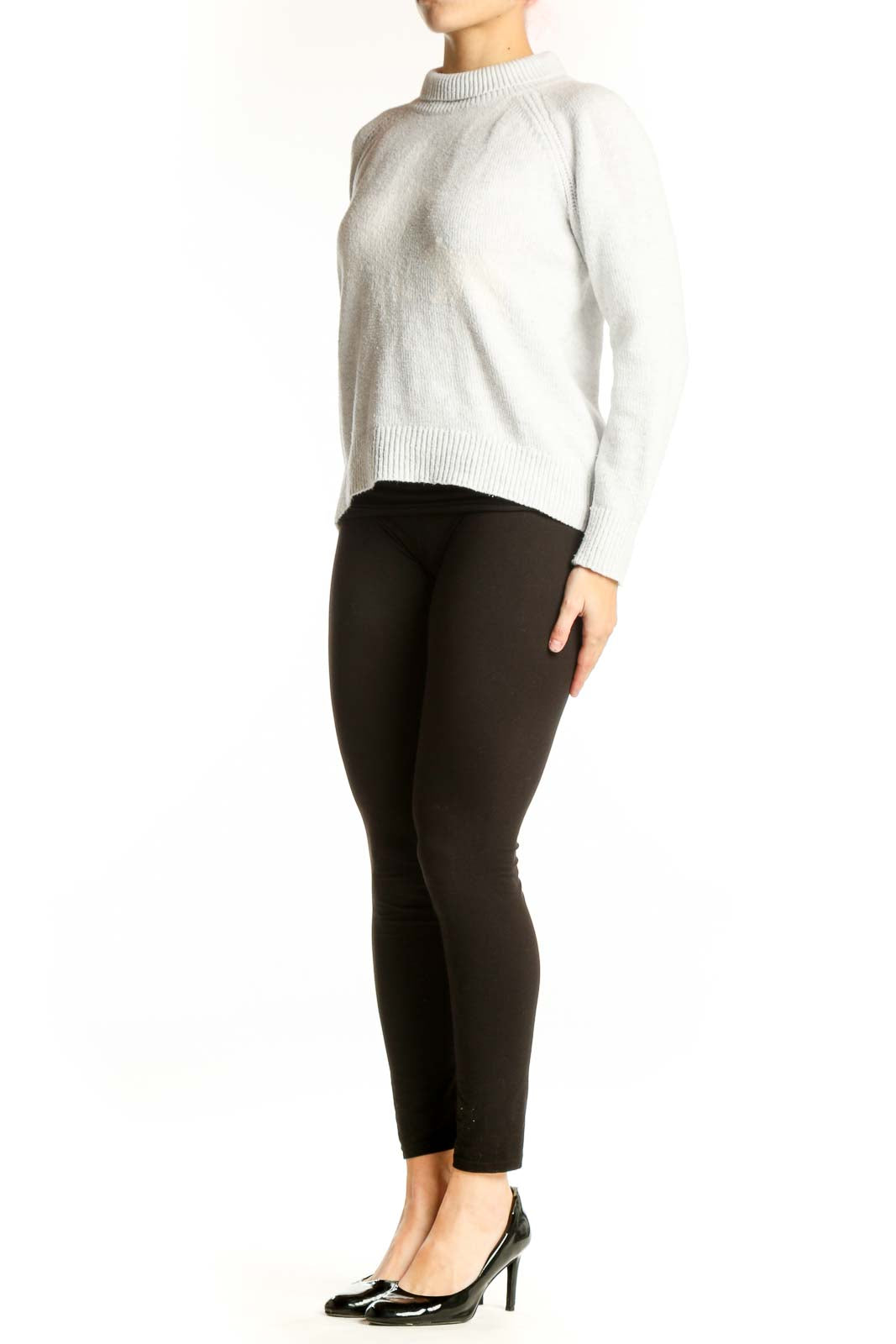 Front view of cream knit pullover sweater with crew neckline and ribbed detailing