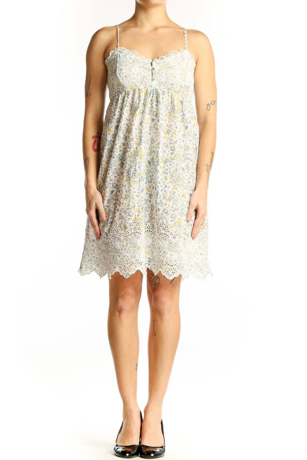 Cream floral Joie dress with sweetheart neckline, empire waist, and eyelet lace hem - front view