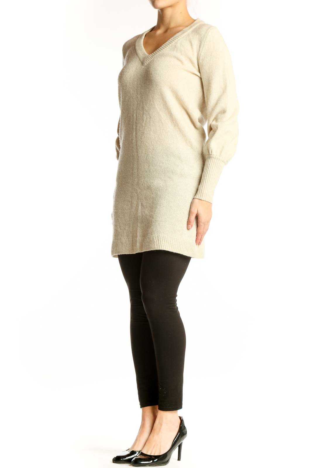 Madewell cream merino wool V-neck sweater dress with long sleeves and ribbed cuffs, front view on model