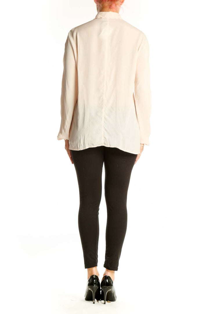 Cream satin viscose button-up shirt back view showing relaxed fit and button closure