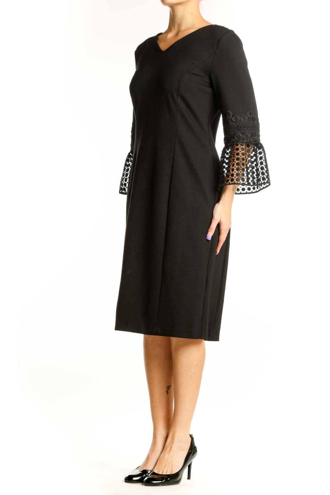 Black lace bell sleeve midi dress with V-neckline and geometric mesh panel details on sleeves