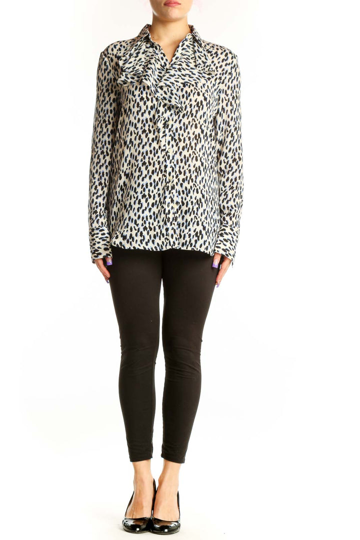 Cream and black leopard print button-up blouse with long sleeves and collared neckline, front view