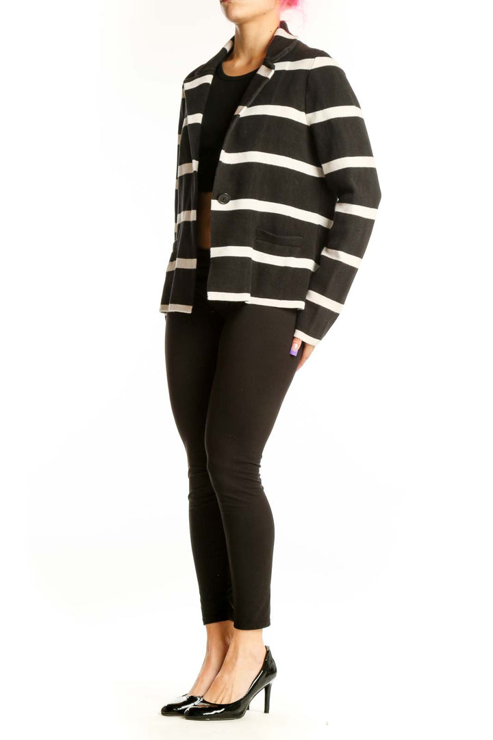 Ann Taylor black and white horizontal striped blazer jacket with button-front closure and tailored fit, front view