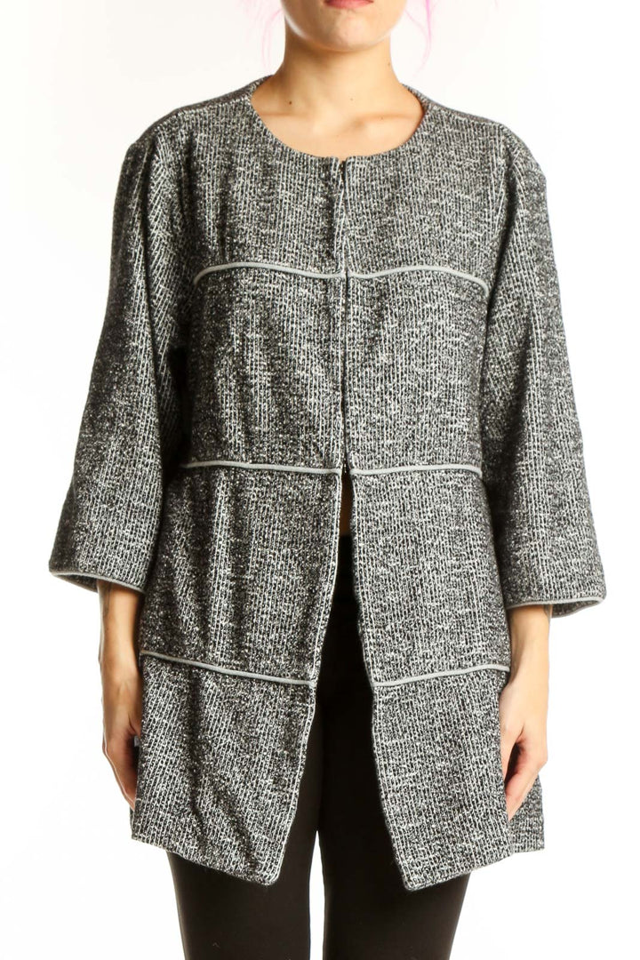 Gray tweed Cabi jacket with button-front closure and contrast stitching, worn on model from front view
