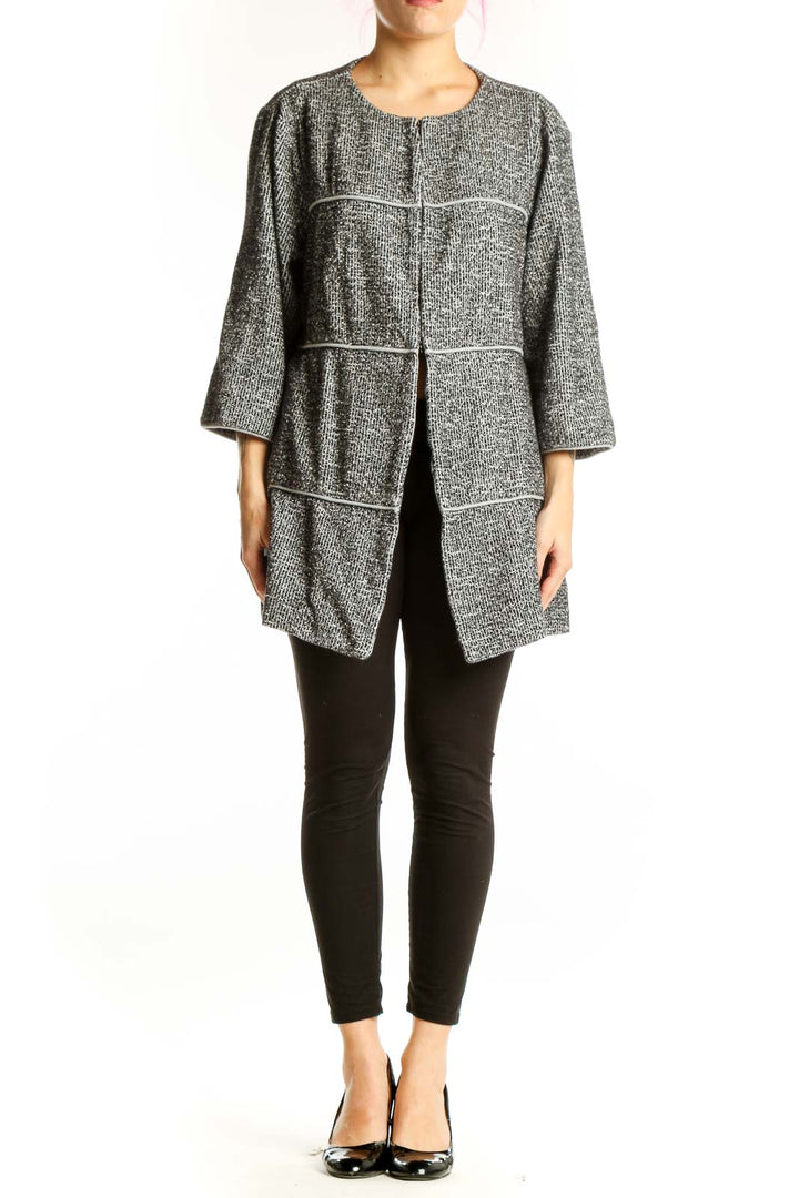 Gray tweed Cabi jacket with button-front closure and contrast stitching, worn on model from front view