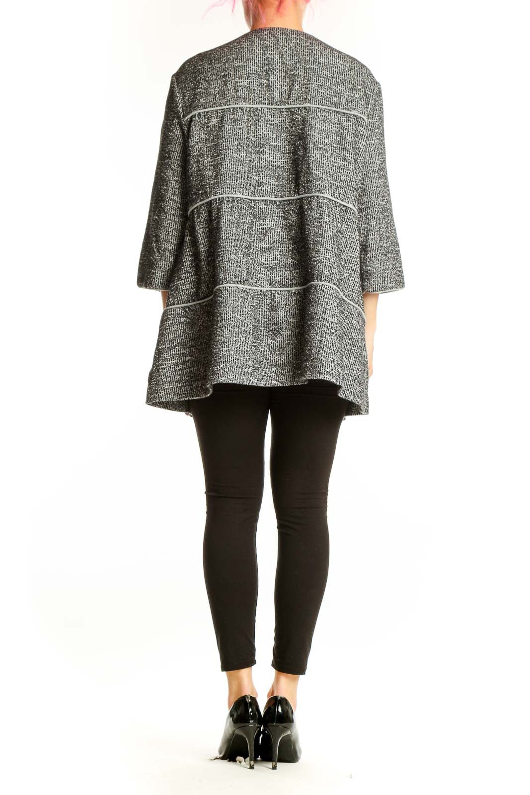 Back view of gray tweed Cabi jacket showing structured silhouette and horizontal seam details