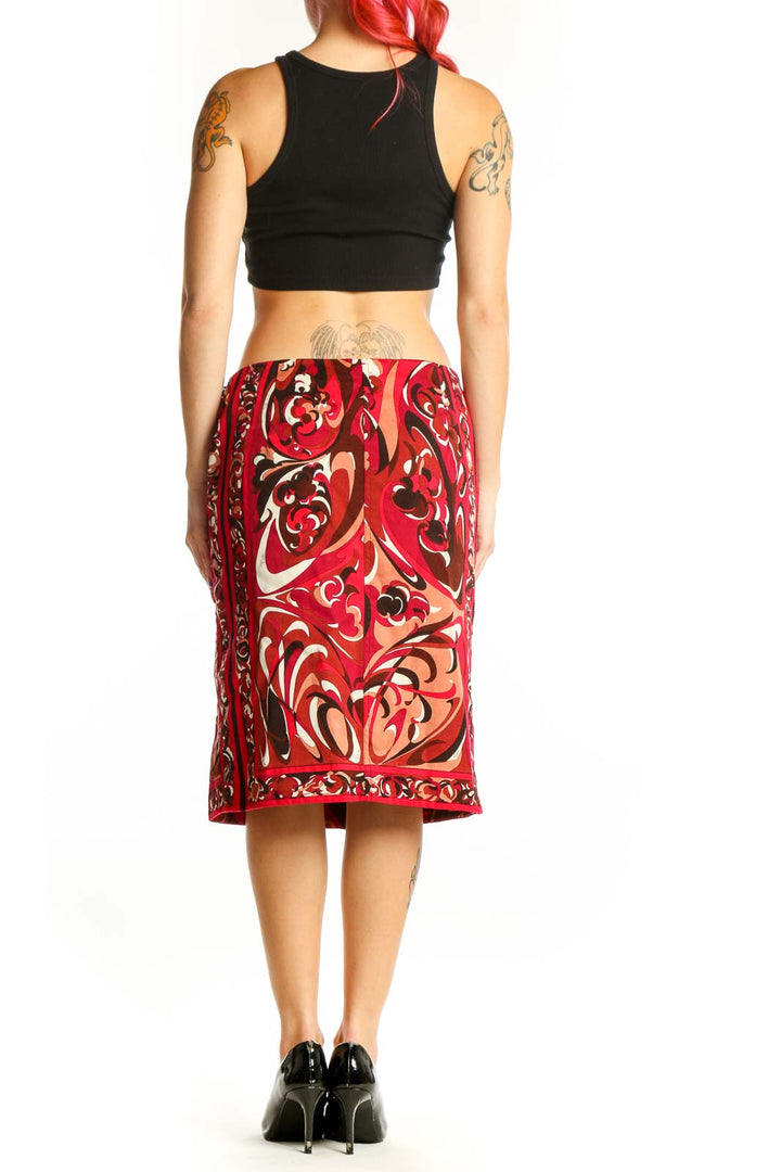 Red ornamental print Emilio Pucci pencil skirt with decorative motifs, back view showing fitted silhouette