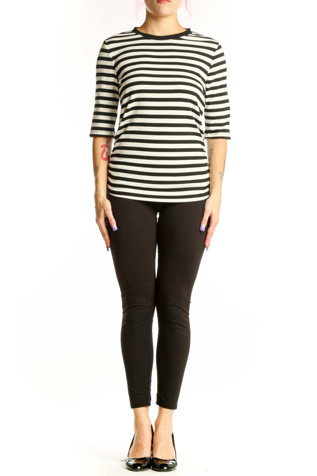 Black and white horizontally striped three-quarter sleeve top by Sanctuary, front view on model