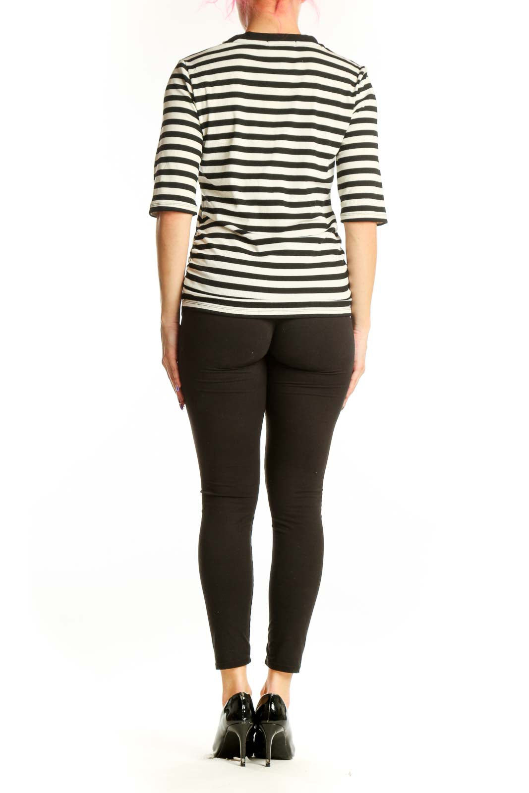Black and white horizontally striped three-quarter sleeve top by Sanctuary, back view on model